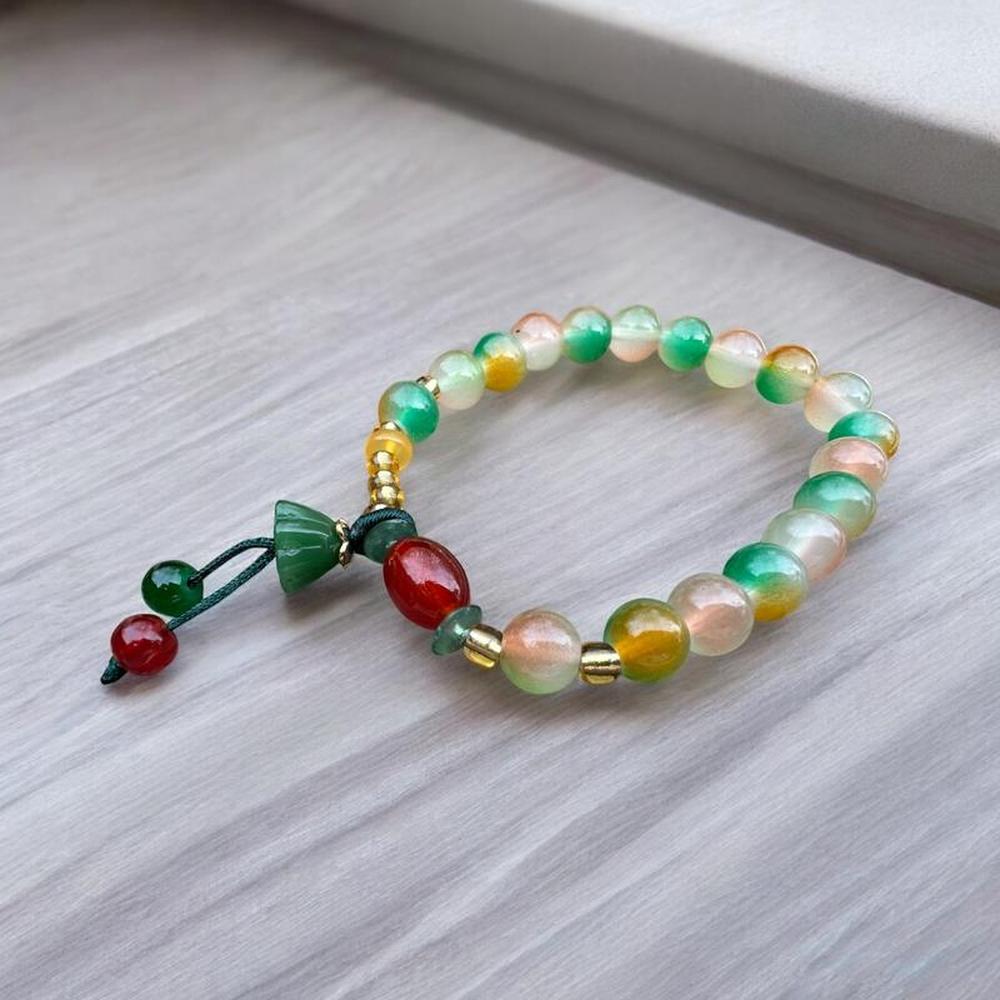 Beaded Bracelet with Green Tassel Charm