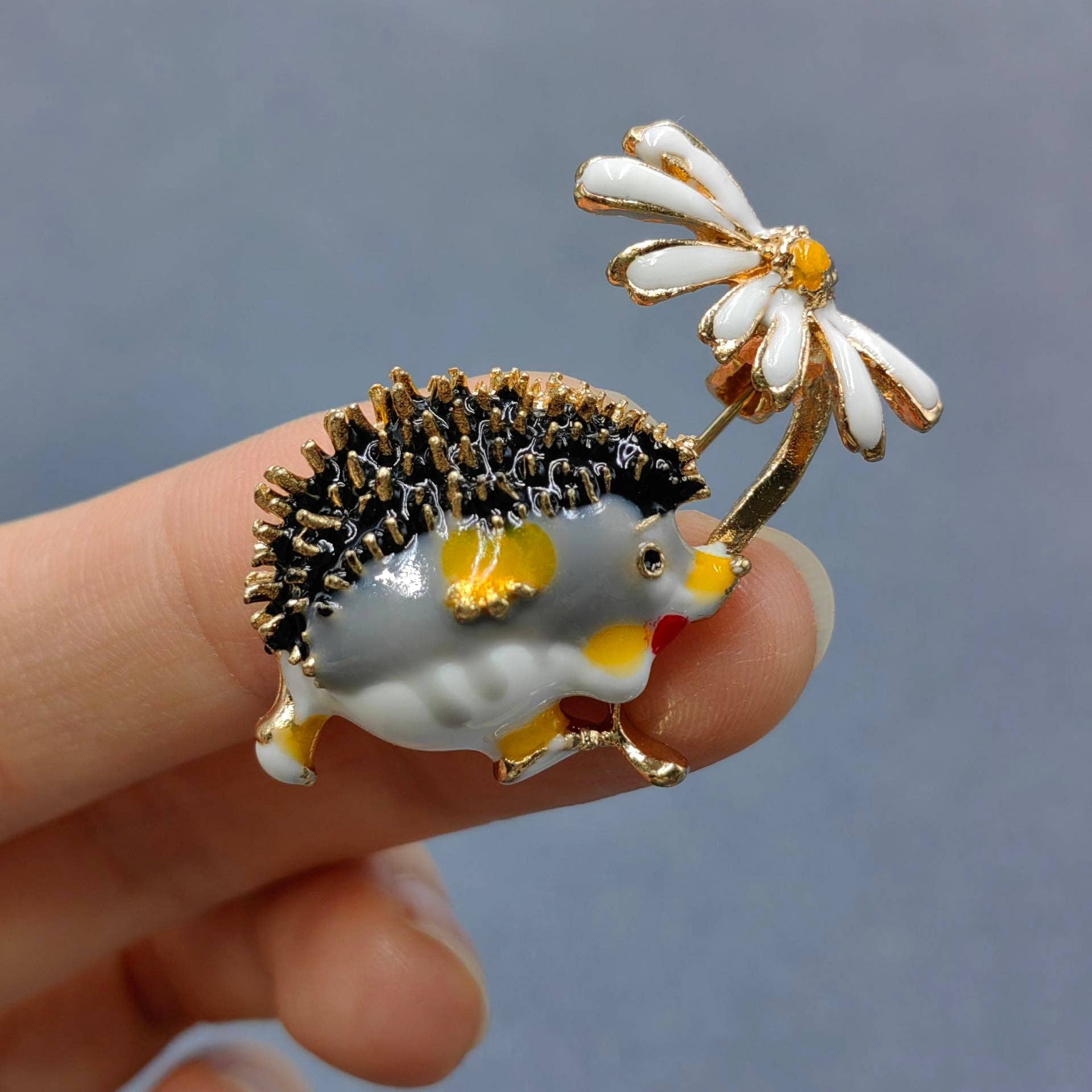 Hedgehog Under Enameled Daisies Brooch