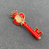 Red Enamel Crown Key Brooch