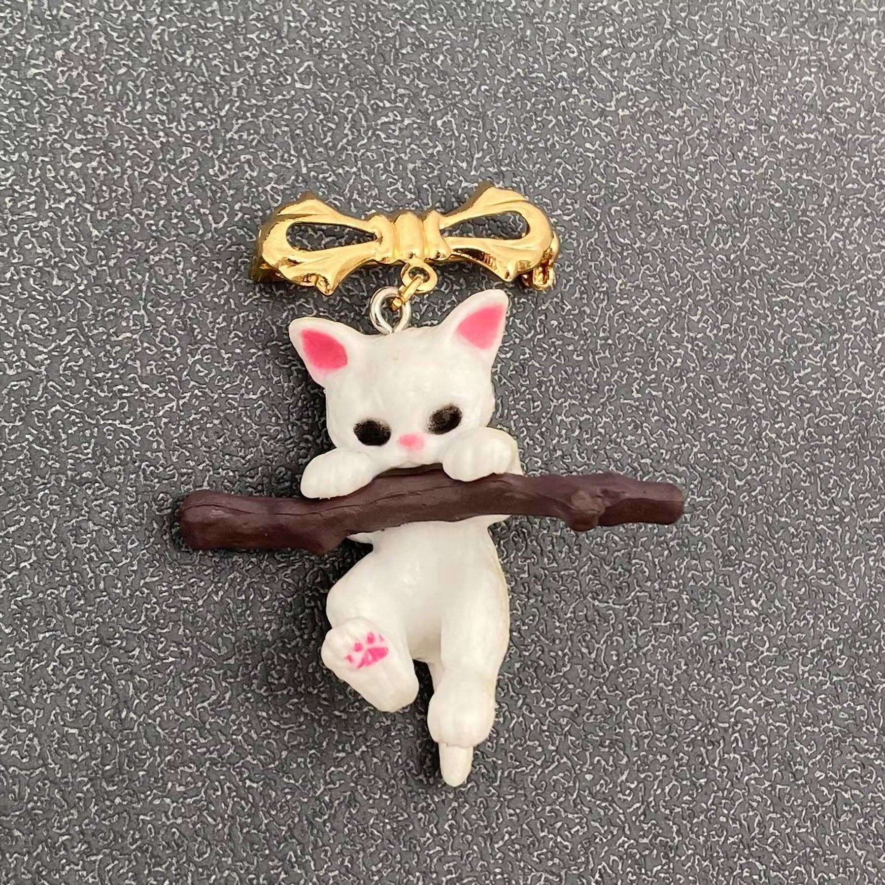 Cat Climbing Branch Resin Brooch