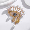 Pearl Eye Charm Brooch