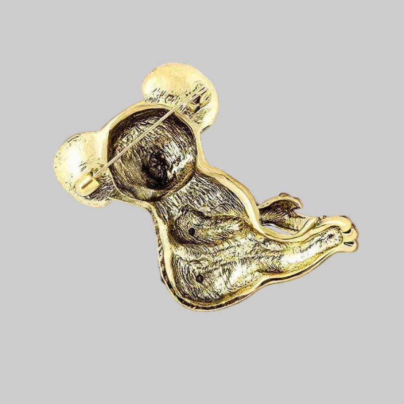 Backside of koala brooch with a unique design on a light gray background