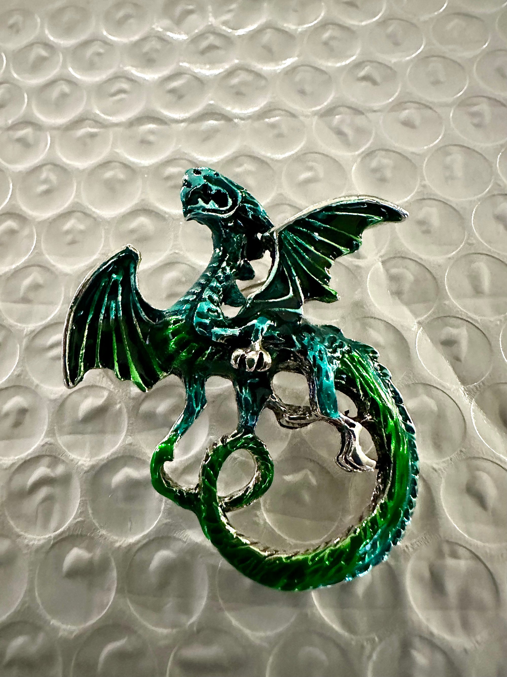 Carved Dragon Brooches