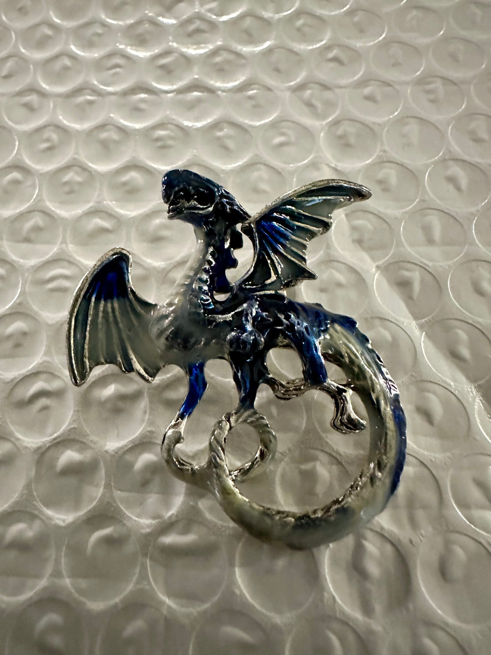 Carved Dragon Brooches