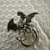 Carved Dragon Brooches