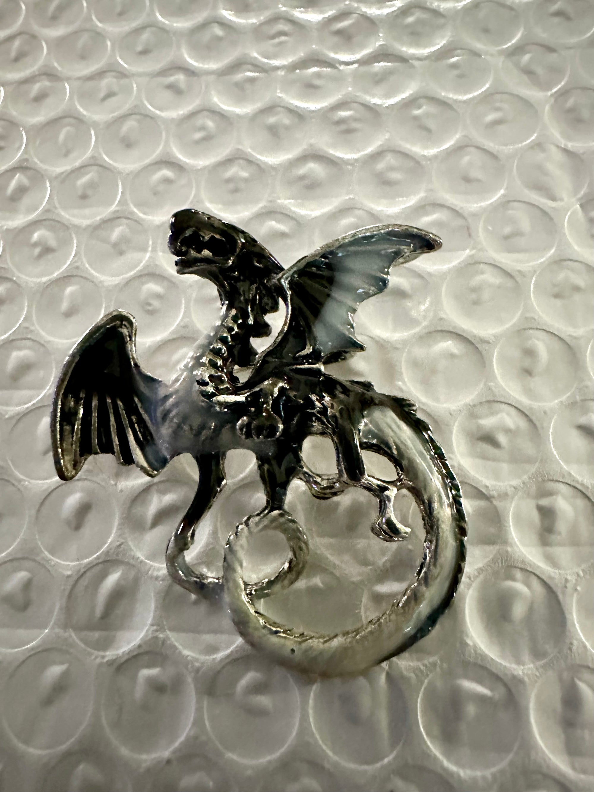 Carved Dragon Brooches