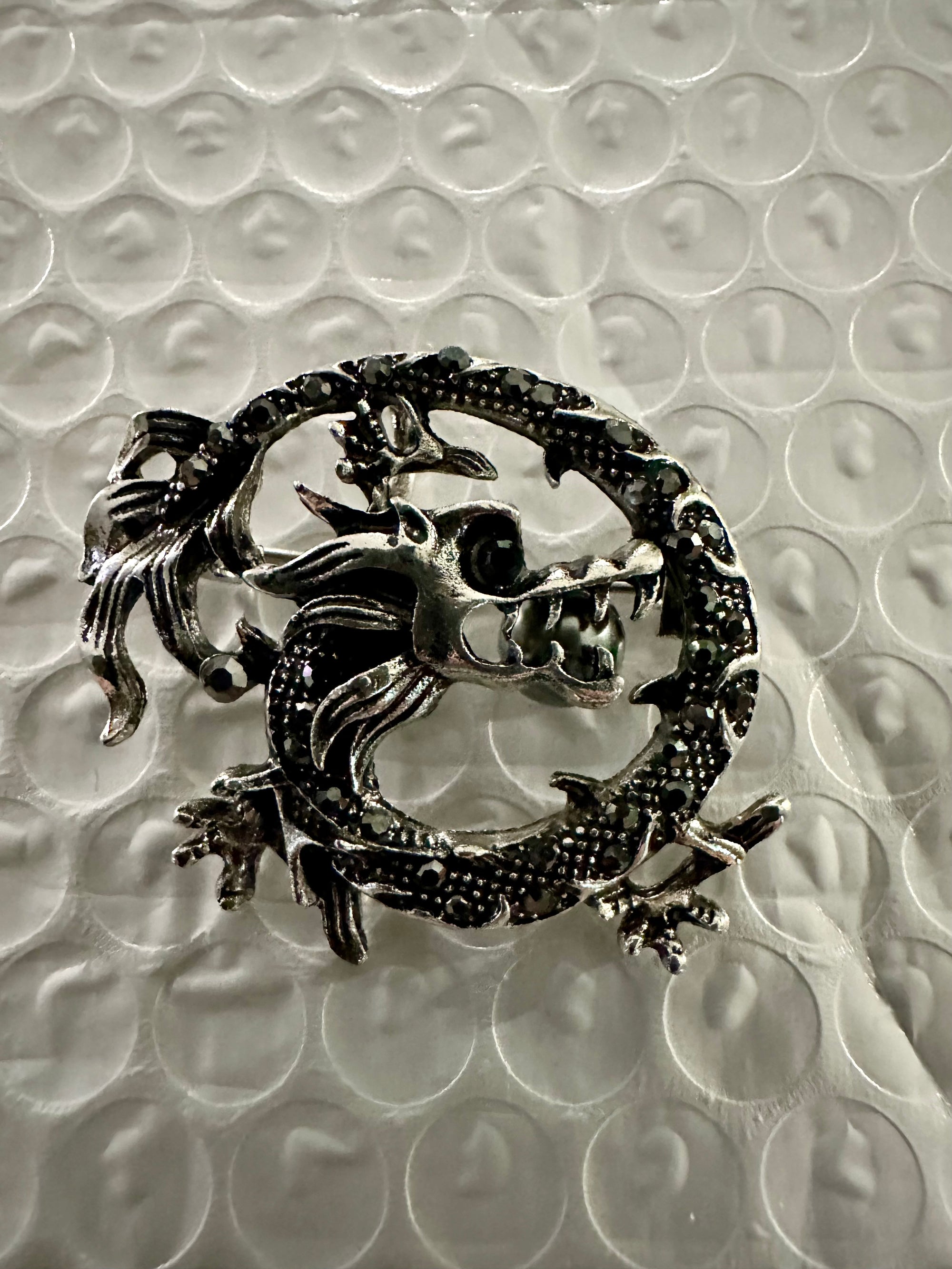 Carved Dragon Brooches