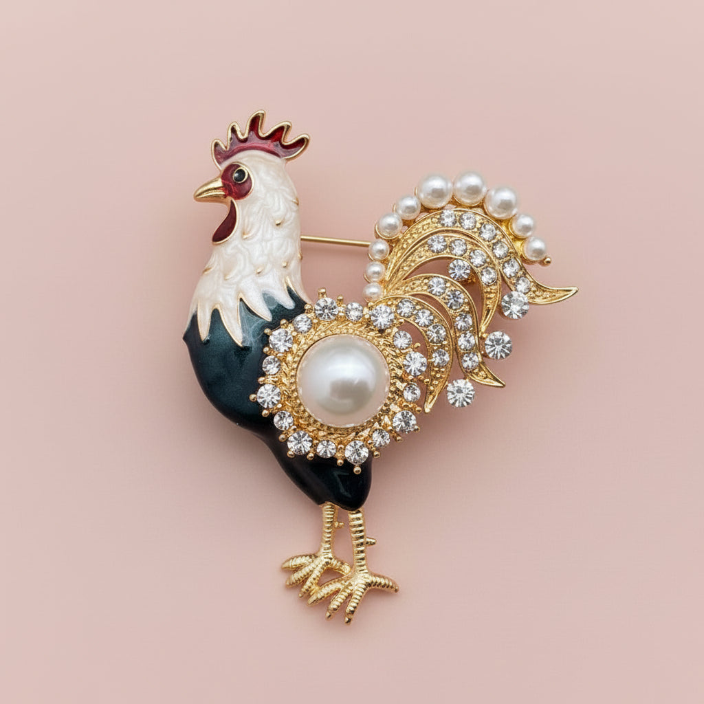 Decorative rooster brooch with pearls and crystals on a pastel background
